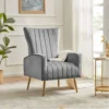 Grey Turkish wing chair with sleek fabric, sturdy gold legs, and a timeless design, blending style and functionality.